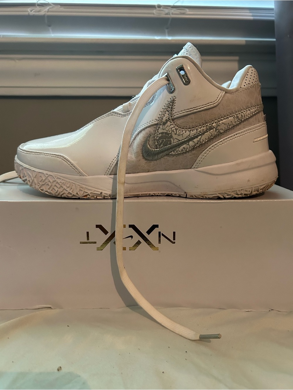 Kids White Sneakers with Silver Swoosh Accent